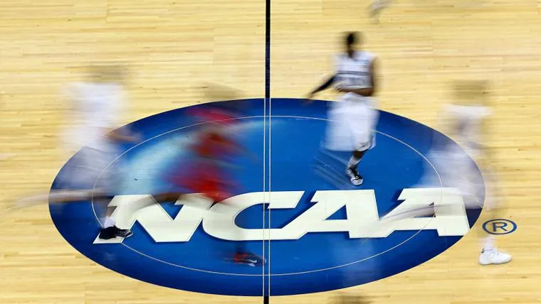 NCAA Championship trophy celebration with confetti