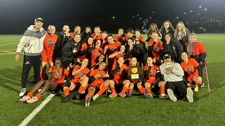 Cowley College women's soccer team celebrating at Tiger Soccer Field